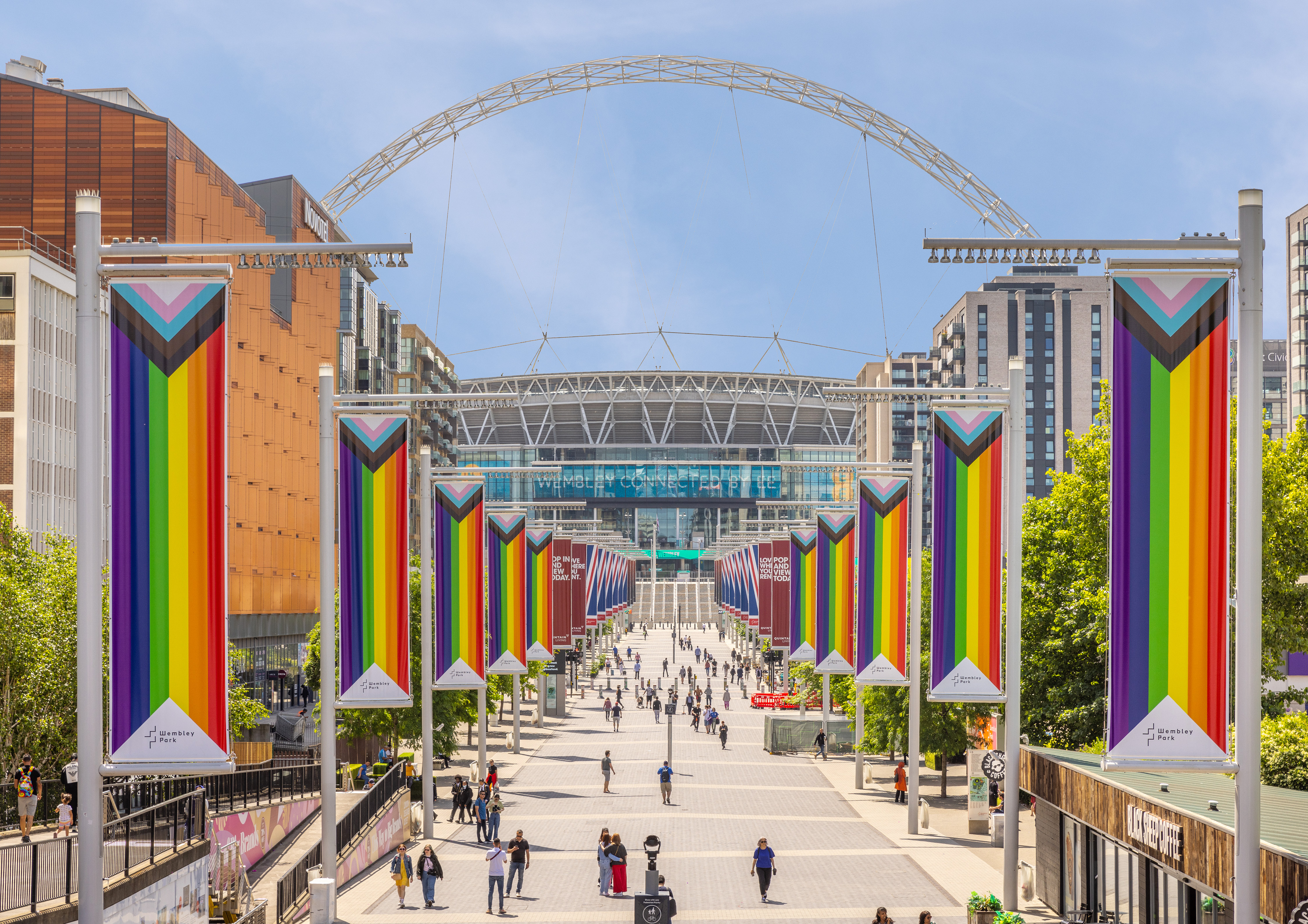 pride flags with wembley stadium in the background