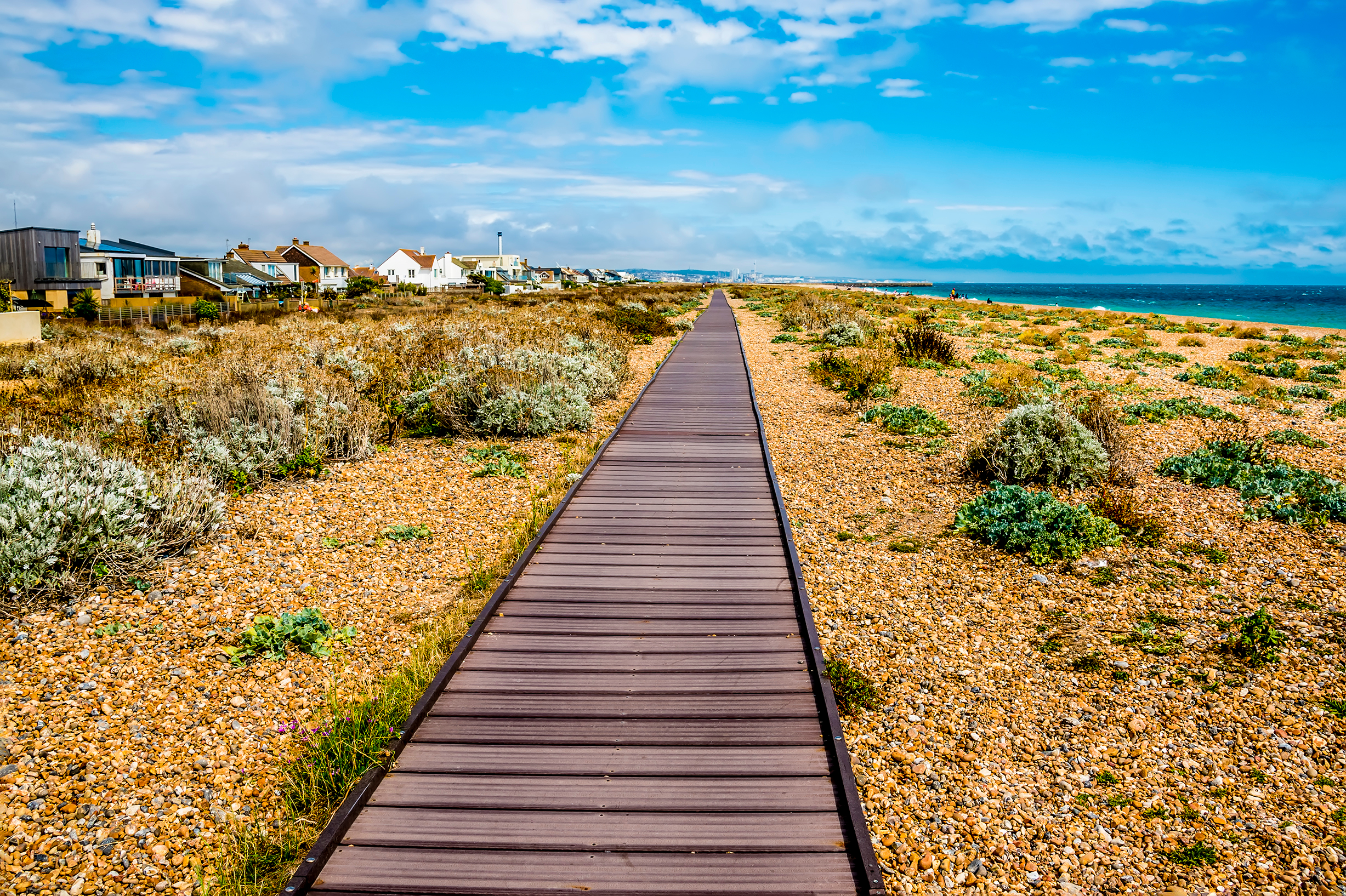 beach with boardwalk in sussex