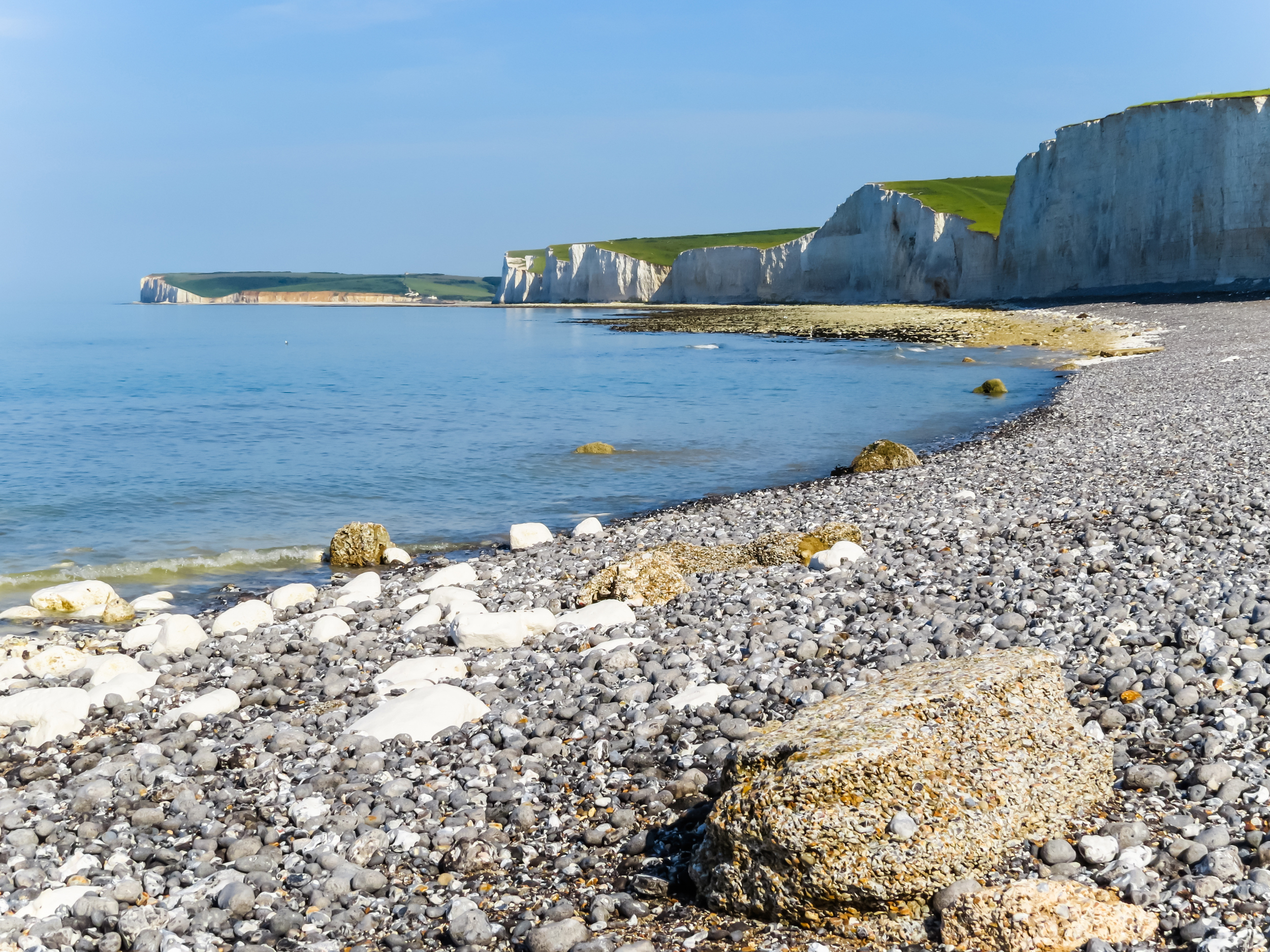 beach with rocks and cliffs in sussex